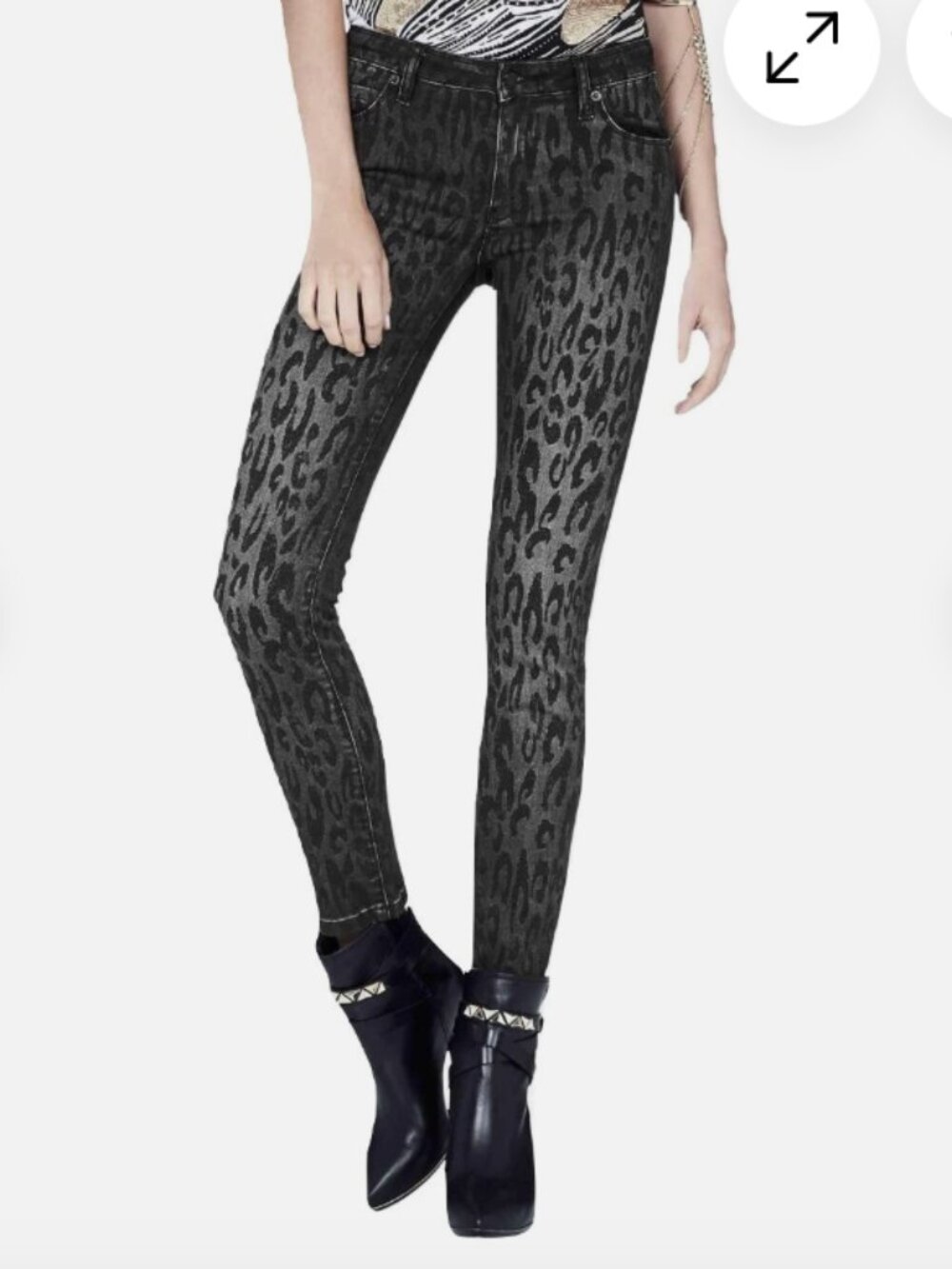 New unworn mid rise leopard print rock skinny jeans
